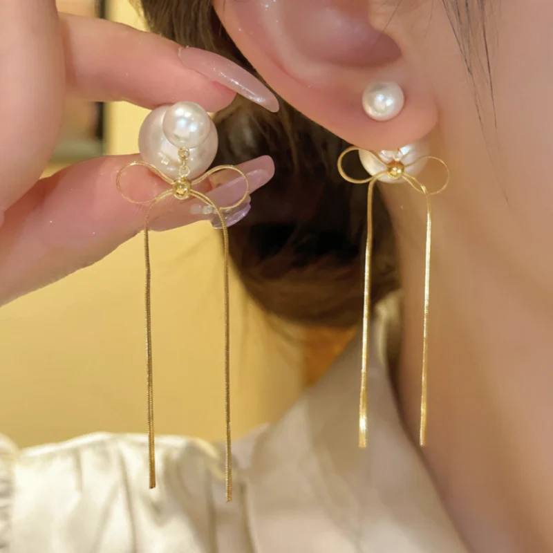 Les clous d'oreille Everly Ribbon